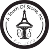 A Touch of Stone Inc logo