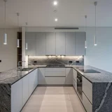 Esos Universal Inc. Granite & Cabinet logo